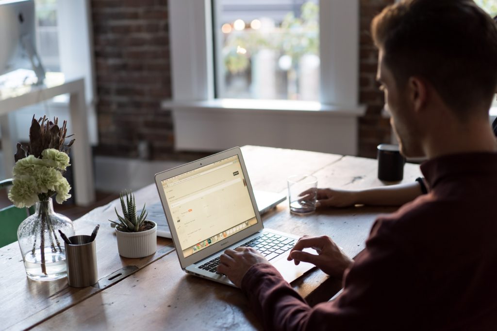 Man sitting at table working